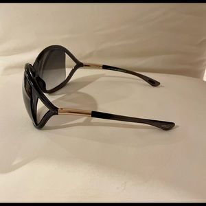 Tom Ford polaraized sunglasses. Bluish/Grey comes with case and cloth.